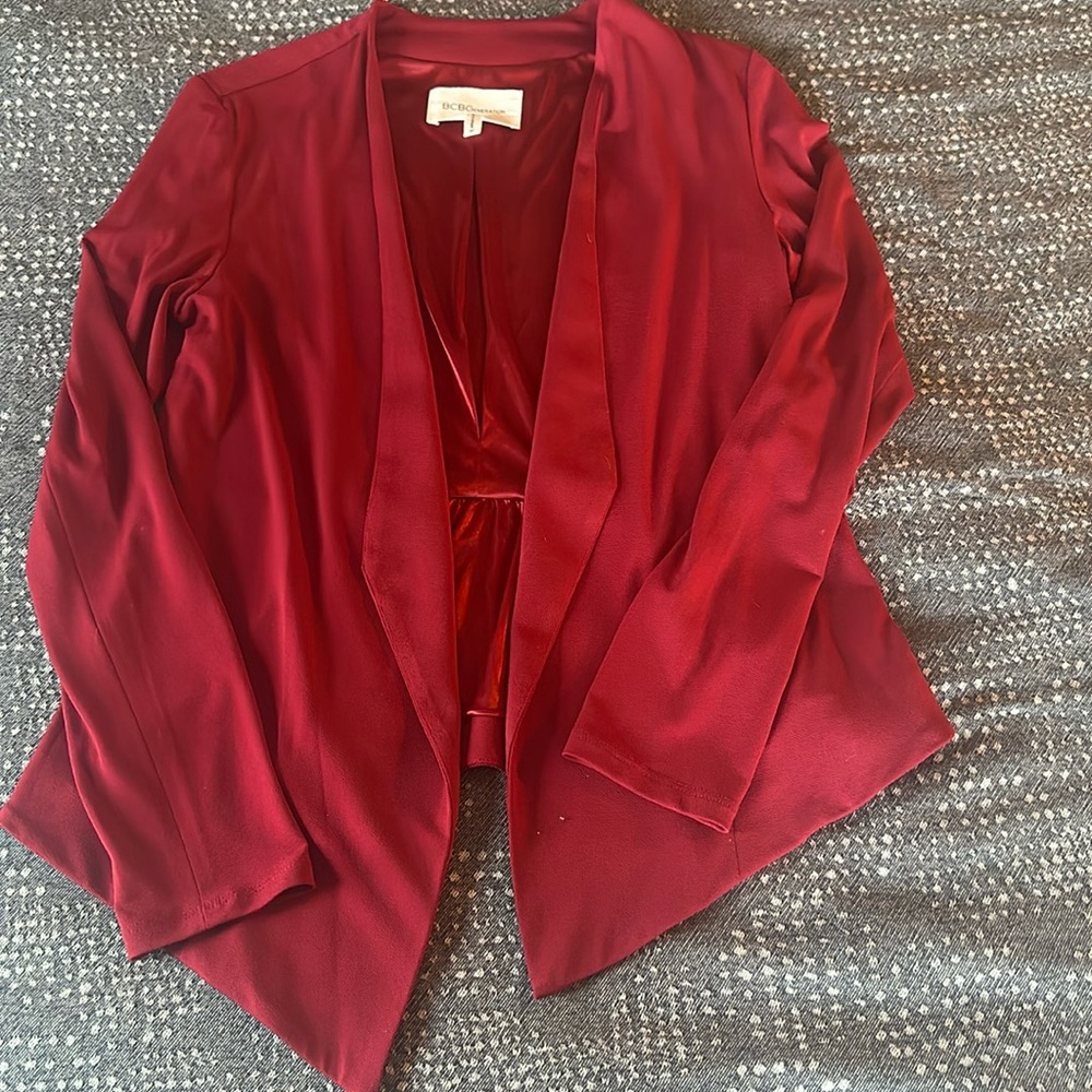 Woman’s red blazer